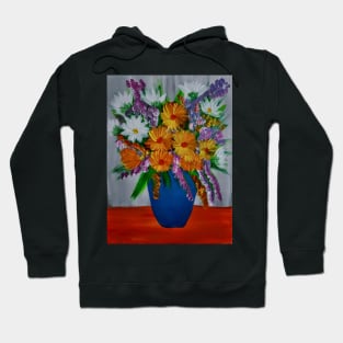 A lovely boutique of flowers in a blue vase Hoodie
